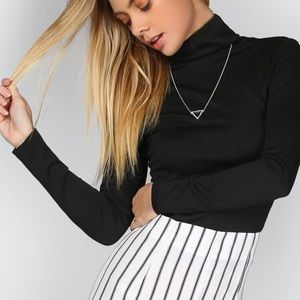 Black fitted turtleneck
